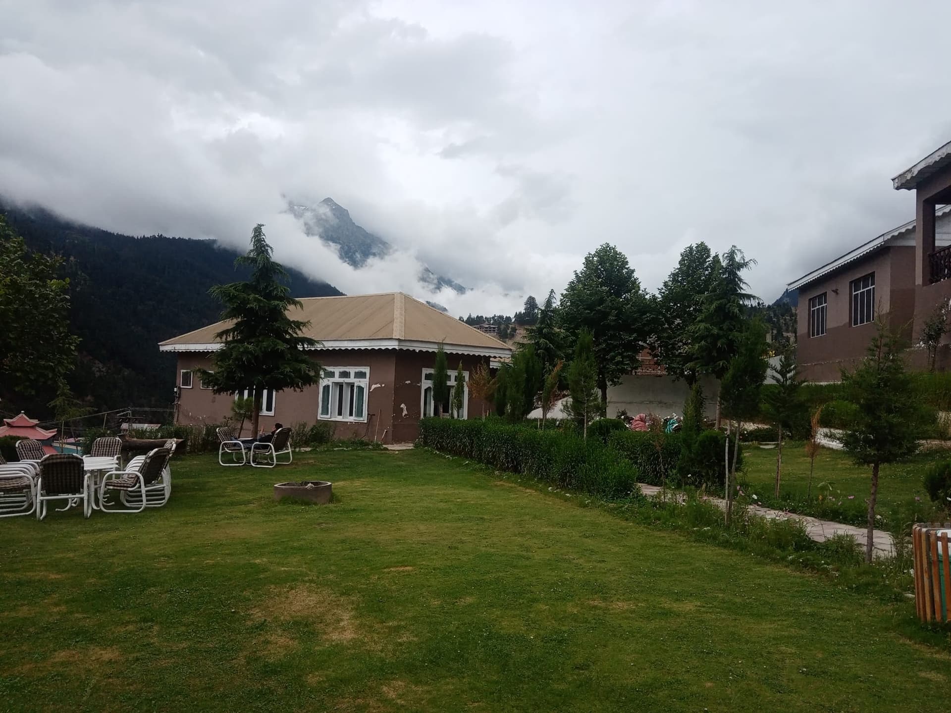 Forest Valley Cottages and garden beneath the mountains of Kalam